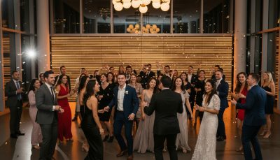 Guests dancing and celebrating on a lively wedding dance floor.